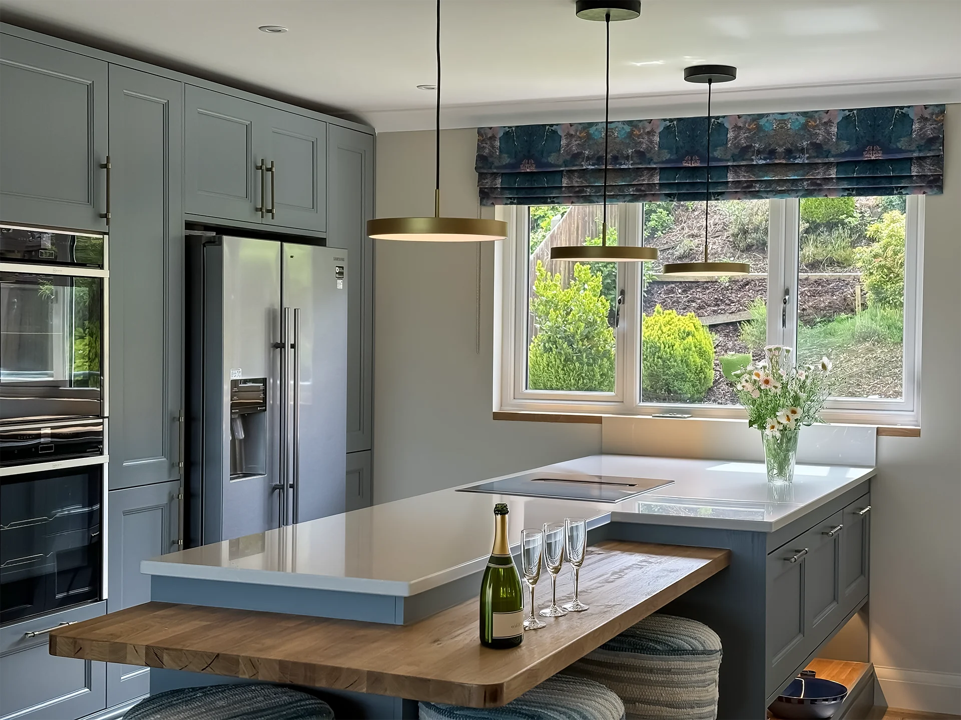 Modern kitchen with island and pendant lights