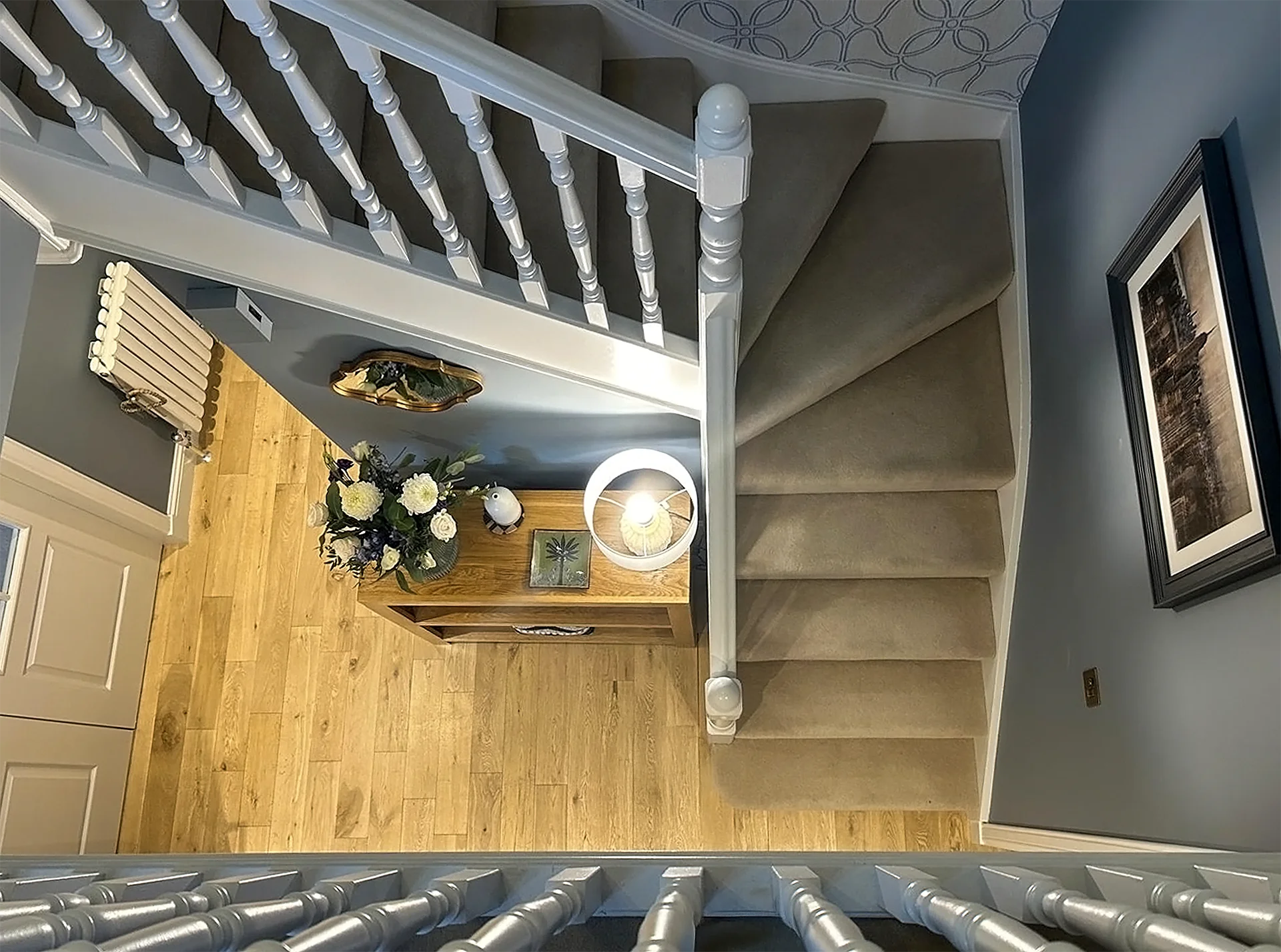 Staircase from above with landing display